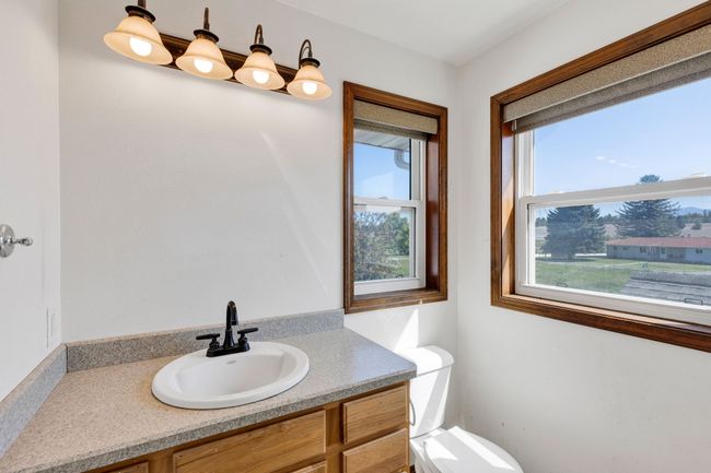 Bathroom with toilet and vanity | Image 41
