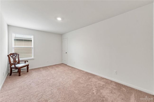 Unfurnished room with light carpet and baseboards | Image 31