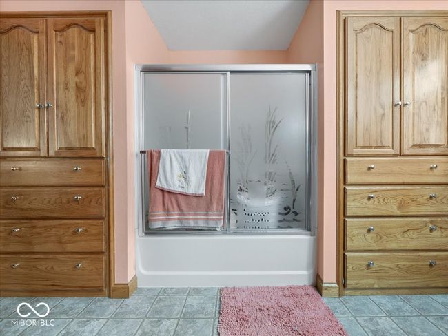 More oak storage in the main bathroom. | Image 23