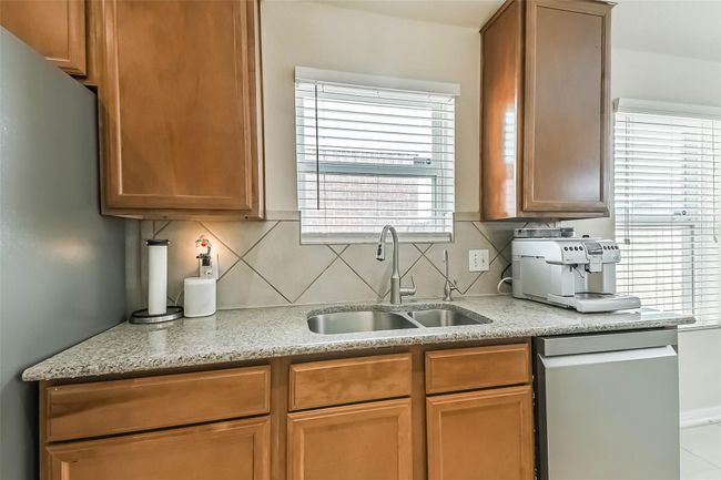 Moen wi-fi kitchen faucet with motion sensor and reverse osmosis drinking water system installed and connected to the refrigerator. LG Signature Top Control Wifi-Enabled Dishwasher with Quadwash. | Image 7