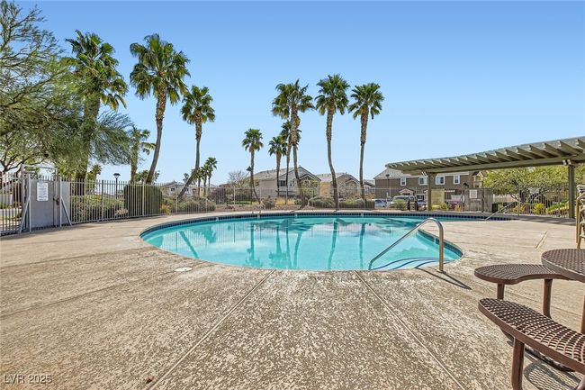 Another view of the View of High Noon at Elkhorn community pool area featuring a beautiful pergola covered area for shade, community clubhouse and safely fenced-in/enclosed deck areas surrounding the well maintained pool | Image 23