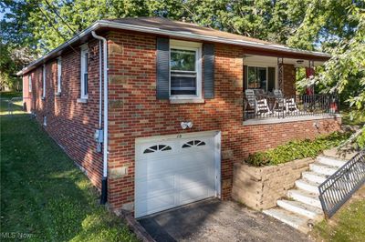 View of front of property featuring a garage | Image 3