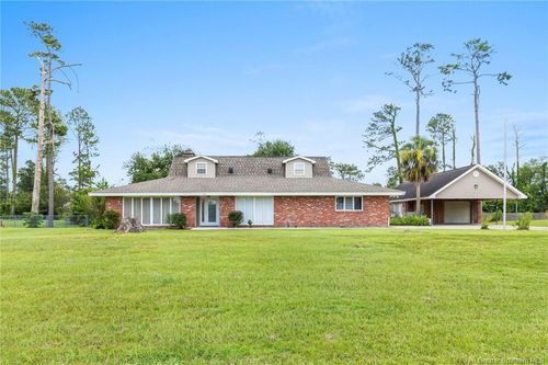 284 W Park Manor Dr, Moss Bluff, LA, 70611-3923 | Card Image