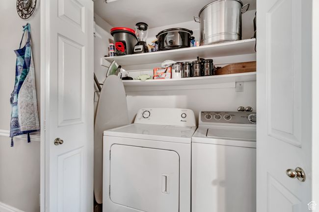 Laundry area featuring separate washer and dryer | Image 9