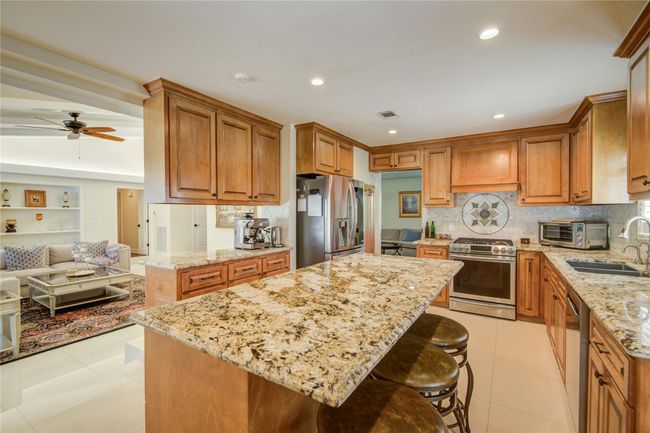 Designed for the entertainer, this open-concept kitchen lets you cook while staying connected to guests. | Image 15