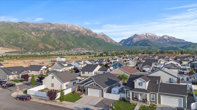 Mountain view featuring nearby suburban area | Image 33
