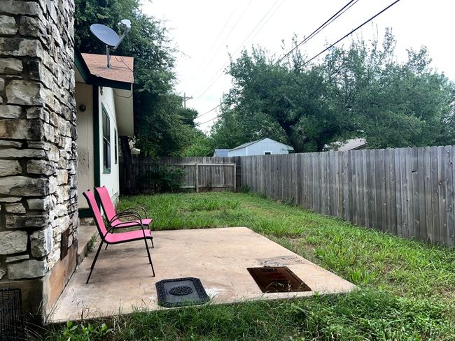 Fenced backyard featuring a patio | Image 22