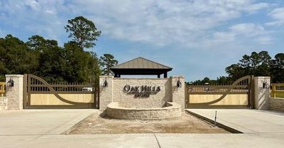 Welcome home to Oak Hills Estates in Hockley! Gated front entrance is near completion, concrete roads, ambient street lighting, only 24 lots with few remaining. | Image 1