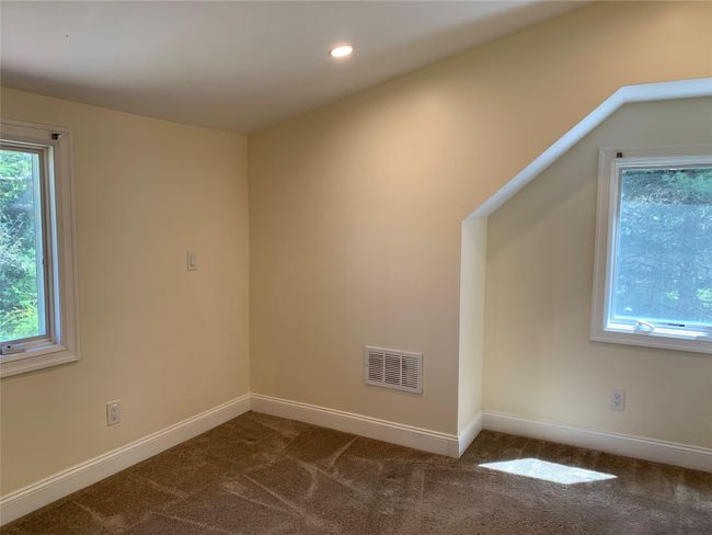 Spare room featuring visible vents, recessed lighting, carpet flooring, and baseboards | Image 15