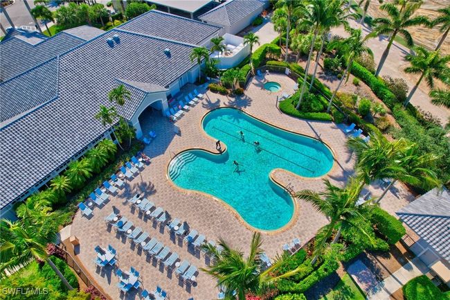 Club house pool with spa and of of lounging chairs | Image 44