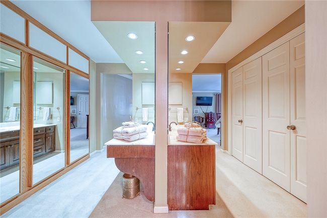 Master bedroom double vanities and two walls of closets | Image 21