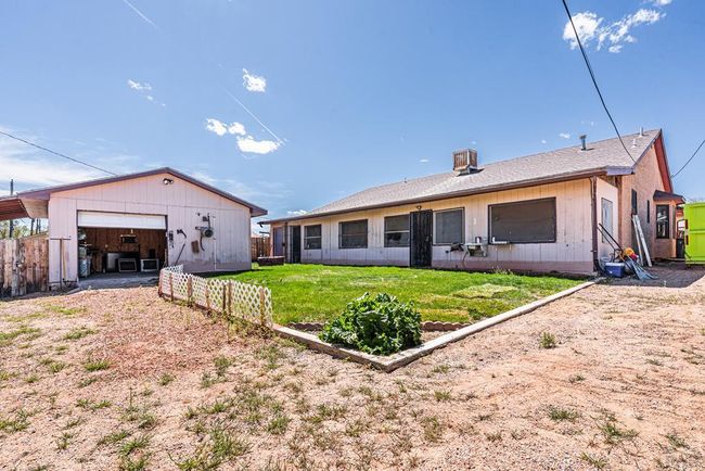 back yard, one car detached garage, sun room or en | Image 33