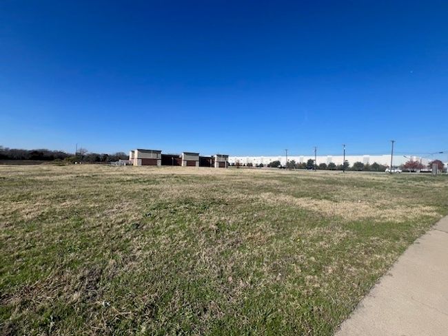 View of grassy yard with a view of rural / pastoral area | Image 7