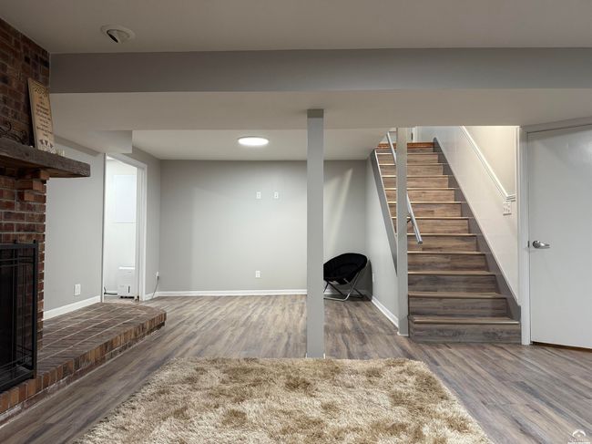L-shaped recreation room has been great for media & game tables, study lounge & group conversations | Image 35