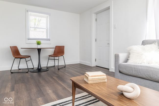 living room featuring wood finished floors and baseboards | Image 15