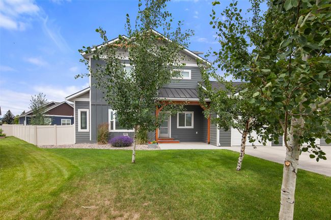 Mature landscape in back yard as well. | Image 62