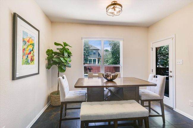 Wonderful breakfast area overlooks the pool. | Image 10