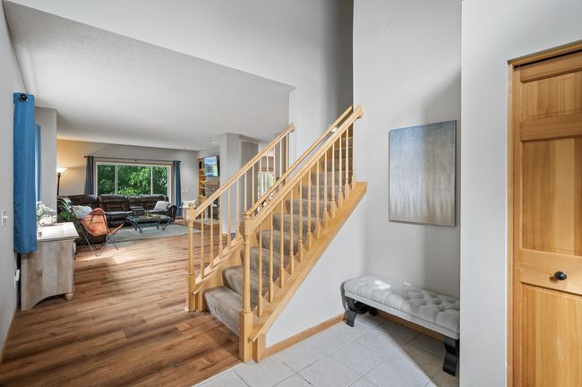Luxury vinyl plank, and tile flooring throughout the main level. | Image 5