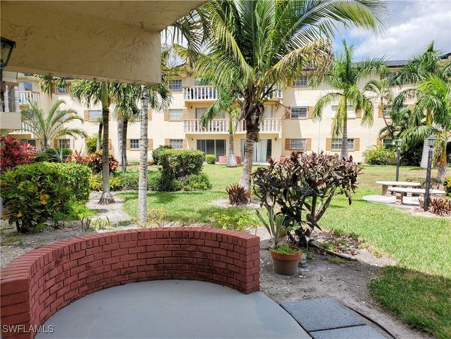 View of property's community with a yard | Image 20