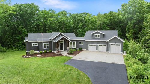 1497 10 Mile Rd Ne, Comstock Park, MI, 49321-9666 | Card Image