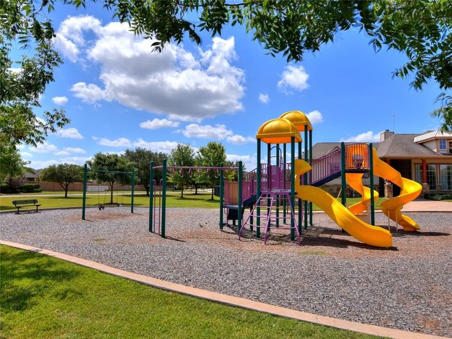 Get to know your neighbors better while you watch your children playing on the outdoor playground equipment. | Image 22