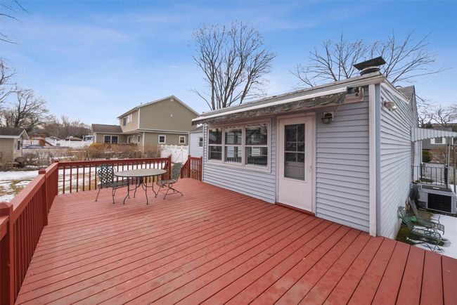 Snow covered deck featuring outdoor dining space | Image 37