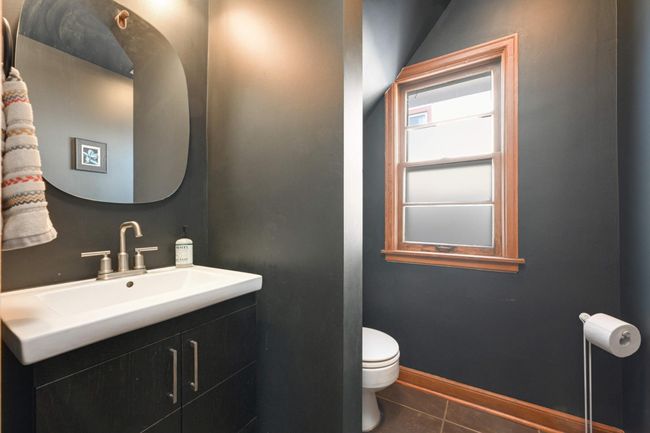 The main floor powder room was renovated & expanded in 2014. | Image 17