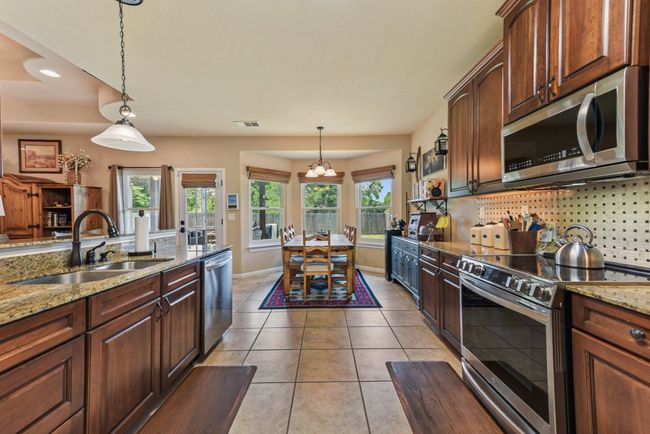 New LG appliances and granite countertops. | Image 16