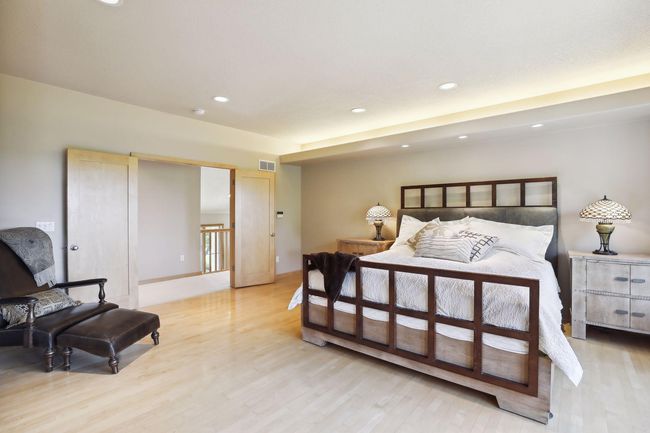 Private, owners sweet features beautiful flooring and gorgeous, solid wood French doors! | Image 24