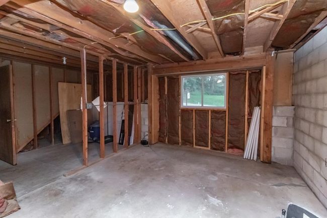 Large unfinished area for potential extra sweat equity | Image 22