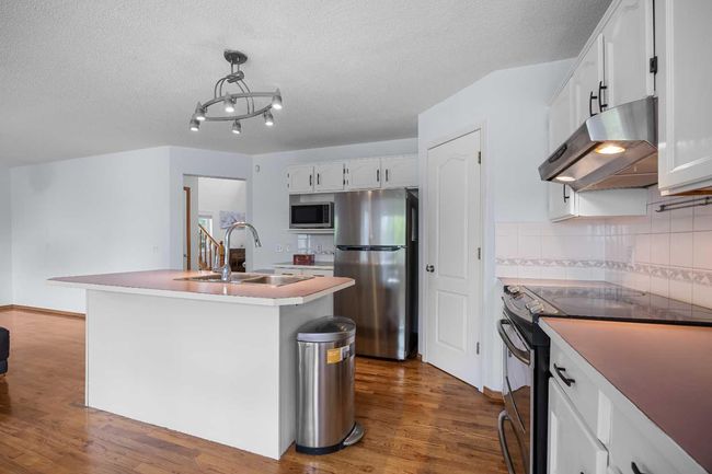 240 Arbour Ridge Way Nw, House other with 6 bedrooms, 4 bathrooms and 4 parking in Calgary AB | Image 12