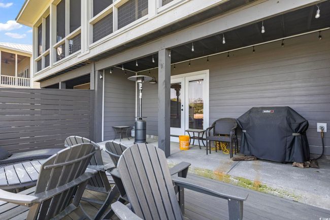 Deck with fence, grilling area, french doors, and a patio area | Image 35