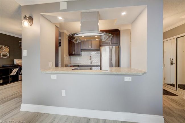 702 - 222 Jackson St W, House attached with 1 bedrooms, 2 bathrooms and 1 parking in Hamilton ON | Image 6