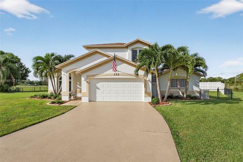 112 Camelot Ct, Royal Palm Beach, FL, 33411-1509 | Card Image