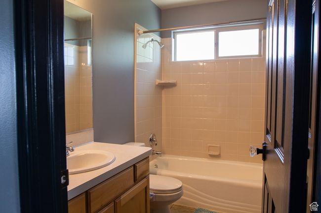 Bathroom featuring vanity, bidet toilet, and bathing tub / shower combination | Image 19