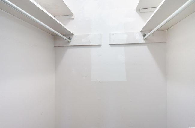 View of walk in closet | Image 13