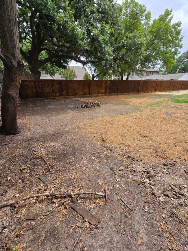 View of fenced yard | Image 9