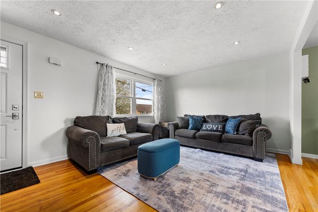 There are lots of natural sunlight and pot lights in this house, so it's never too dark. | Image 4