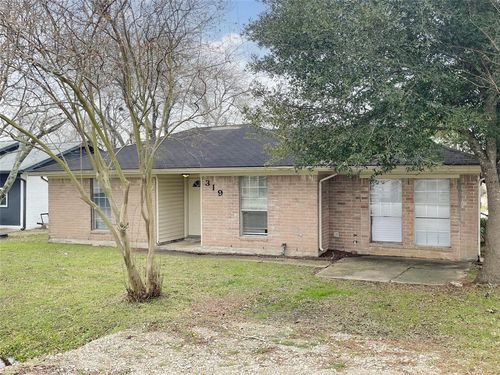 319 N 9th St, Beasley, TX, 77417-9415 | Card Image