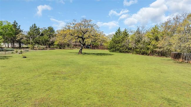 View of yard with fence | Image 10