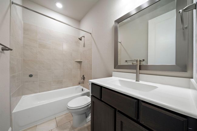 2nd full bathroom located on the first floor features a tub/shower combo. | Image 18