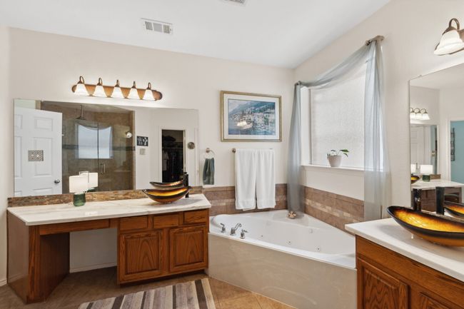 Separate vanities with makeup sitting area | Image 21