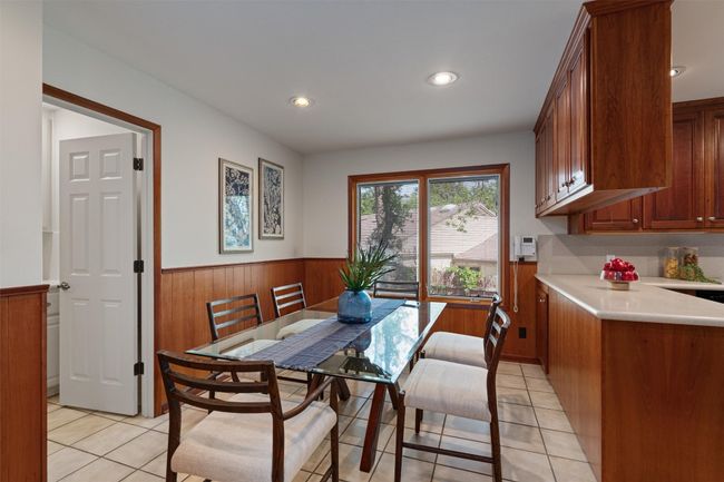 Casual dining area open to the kitchen and living area | Image 15