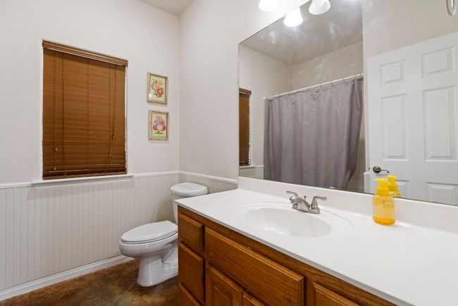Simple, bright, and move-in ready—the guest bath offers charm and functionality in one tidy package. | Image 23
