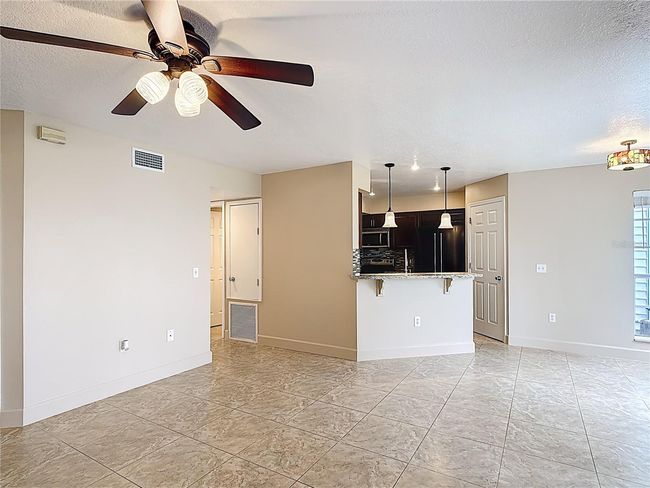 Kitchen overlooking living area | Image 5
