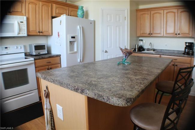 7841 Breakwater Ct, House other with 2 bedrooms, 3 bathrooms and 1 parking in BOKEELIA FL | Image 7
