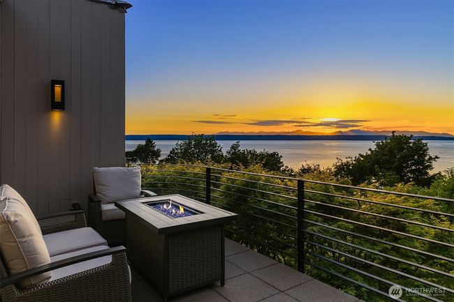 Sip a chilled glass of wine while grilling local salmon. | Image 11