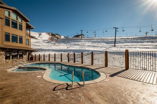 Spacious pool and hot tub | Image 29