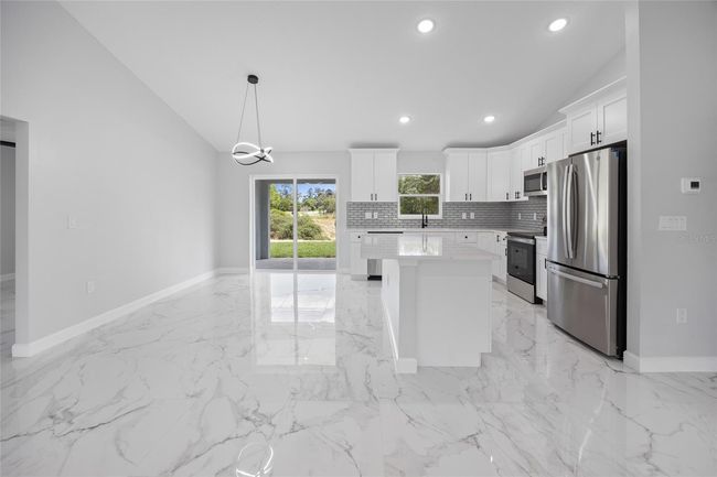 kitchen dinning and back porch | Image 29