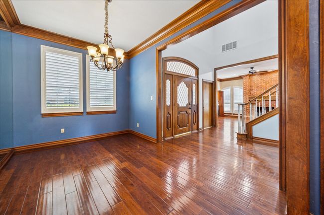 The dining room can become a home office with the addition of french doors. | Image 15